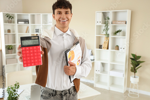 Male accountant with calcul...
