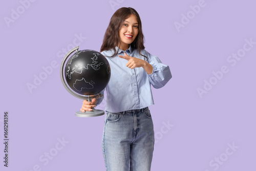 Young Asian woman pointing ...
