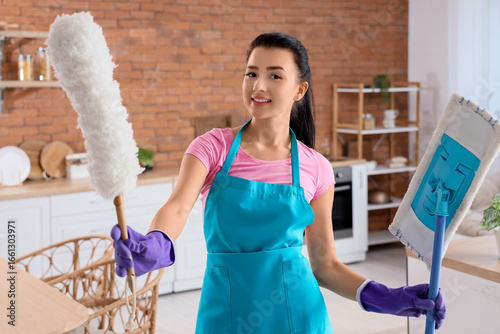 Young woman with pp-duster ...