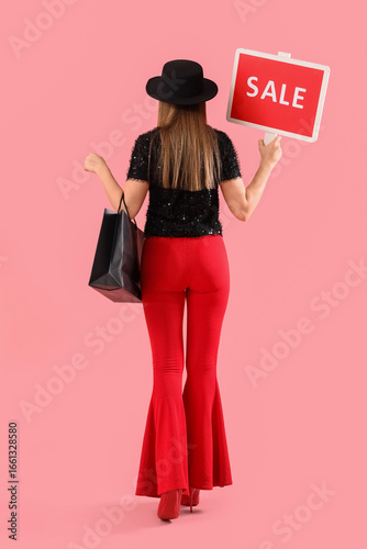 Beautiful young woman with ...