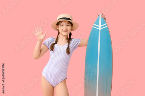 Cute girl in swimsuit with ...