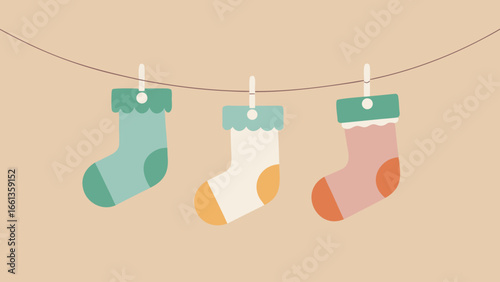 Three socks hanging from a line with clothespins in pastel colors on a light brown background design