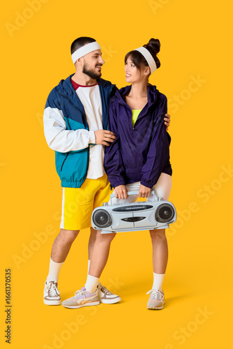 Young couple with boombox o...