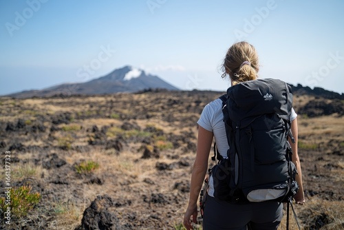 Hiker hiking volcano landscape