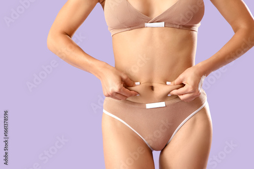Young woman in underwear wi...