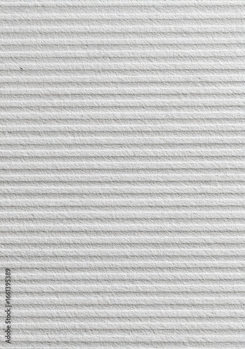 Close-up of textured, white, horizontal ribbed surface
