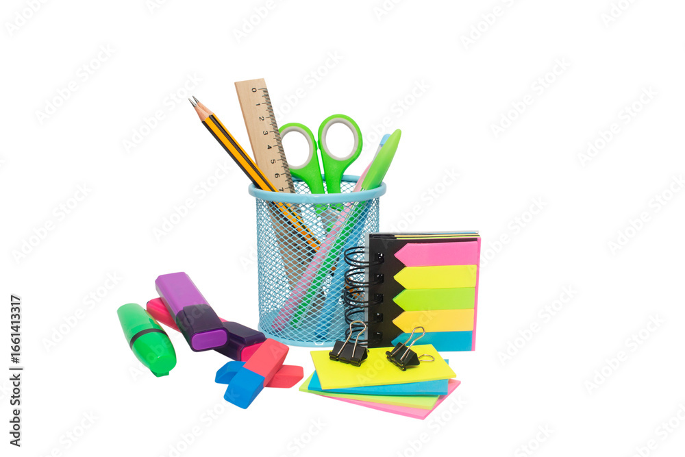 Obraz premium School and office supplies, pens, pencils, ruler, compass in a metal cup on a white background