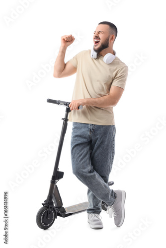 Young man with electric kic...