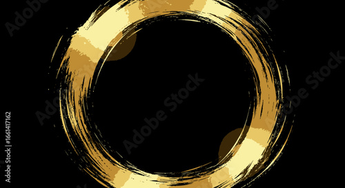 Photos Gold brushstroke circle frame on a black background.