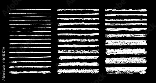 Chalk brushes. Grunge brush strokes and charcoal lines with rough textures in white on black. Bold dynamic, handmade pencil asset for typography, logos, posters, urban design. Distressed vector set