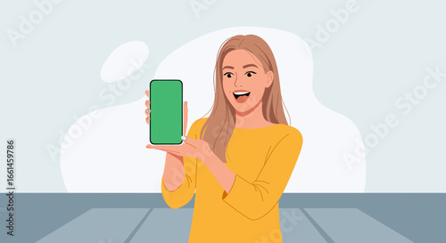 Young woman happily presents a smartphone with a green screen, perfect for showcasing mobile apps, online services, or digital content. Ideal for technology promotion.