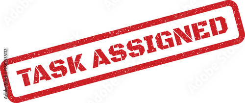 Distressed rubber stamp illustrating “Task Assigned” message, with speckled texture and clean background