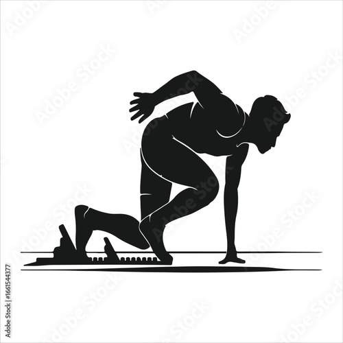 Athlete in starting blocks ready to sprint