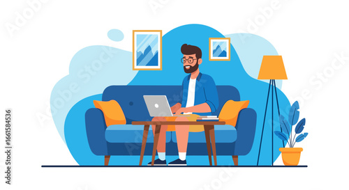 Cheerful bearded man with glasses works on a laptop from his cozy sofa in a modern home living room. Perfect for remote work, freelancing, or online learning.