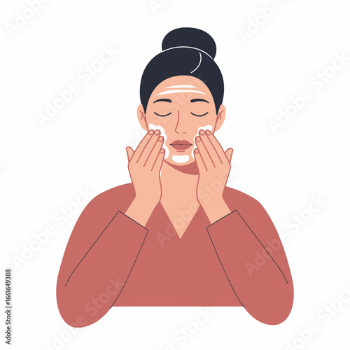 A serene woman with her eyes closed gently applies a luxurious foamy cleanser to her face as part of a refreshing skincare routine, promoting beauty and self-care.