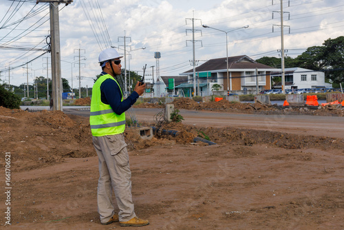 Engineers are inspecting the readiness and completeness of a large construction project involving pipe laying and road construction.Civil engineer,construction,roadconstruction,engineer,drainage pipe.