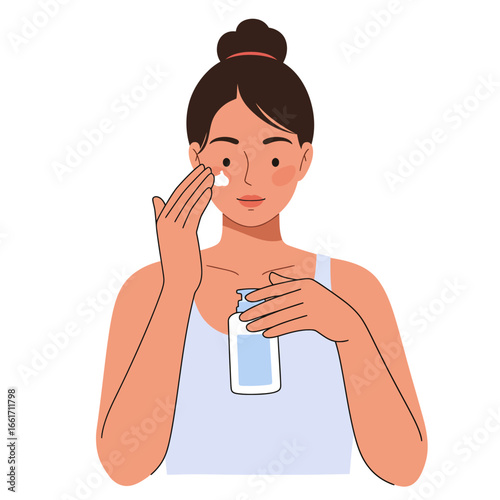 A young woman is applying a moisturizer to her face, performing her daily skincare routine for healthy and glowing skin.
