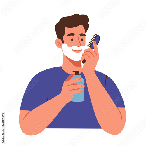 A smiling young man with a neatly trimmed beard applies white shaving foam to his face using a brush, preparing for his daily grooming routine.
