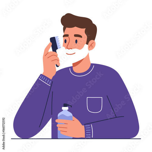 A smiling young man with a neatly trimmed beard applies luxurious shaving cream using a traditional brush, preparing for a clean shave.