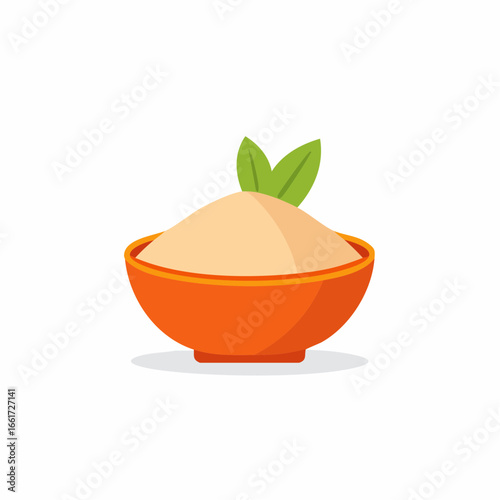 Orange bowl of flour with green leaves in a modern design