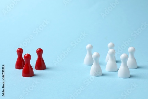 Принти на полотні White and red pawns on blue background