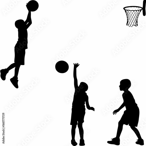 Silhouette of boys playing basketball with hoop and ball in action