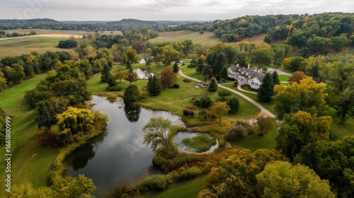 Wallpaper Mural Panoramic view of countryside estate with manor, rolling hills, ponds, and gardens Torontodigital.ca