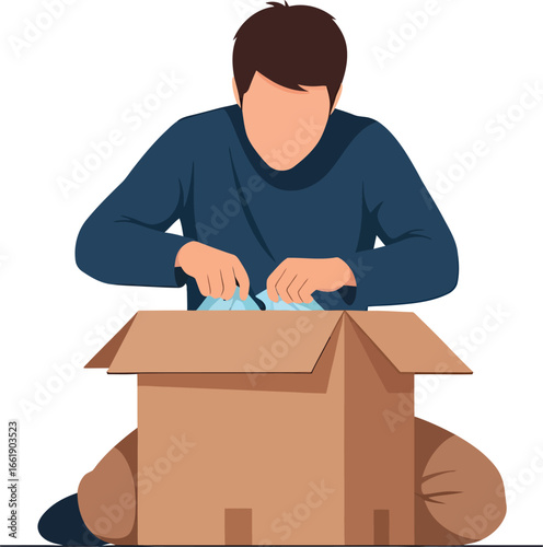Person unpacking a cardboard box with items inside.