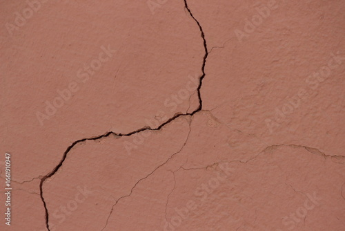 A close up of a cracked wall