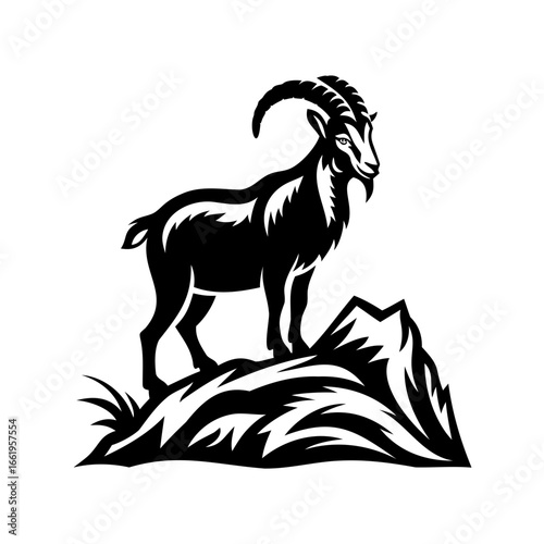 A Majestic Ibex Silhouette Stands Proudly Atop a Jagged Rocky Peak