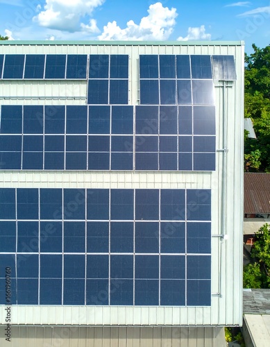 Solar panels on a light beige metal roof