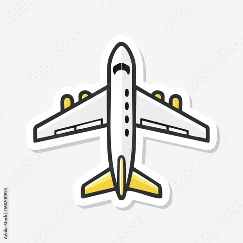 Top-down view of a white airplane with yellow accents, ready for flight.