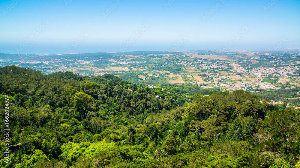 Fototapeta premium Sintra, Portugal - July 8 2025: The panoramic view from Castle of the Moors in Sintra, Portugal