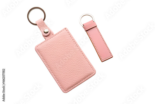Two pink leather keychains with metal rings isolated on transparent background