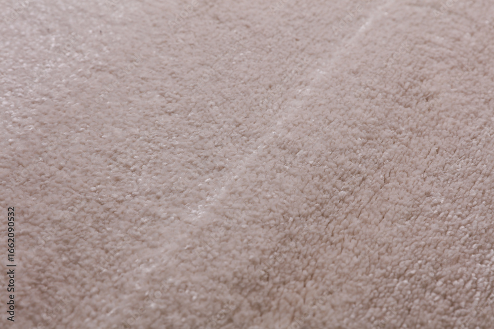 Fototapeta premium Beautiful soft shaggy carpets rugs texture close up.
