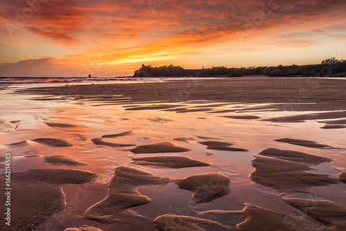 Guidel Morbihan Clohars Carnoet Finistere Sunset Glow Over Tidal Pools on Sandy Beach