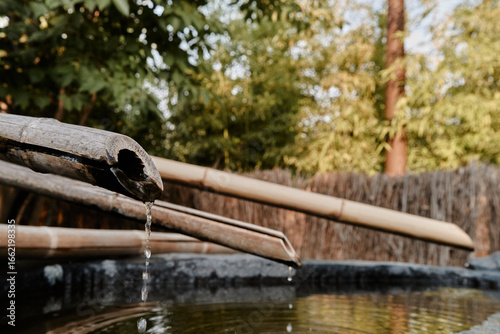 drinking water from bamboo pipes