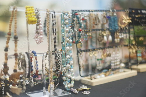 Display of handmade costume jewelry, made by me, street vendor small business