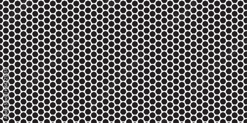 Metallic steel mesh pattern texture on a black background