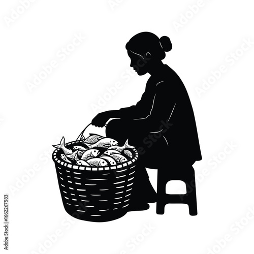 Silhouette of a woman sitting on a stool sorting fish in a woven basket