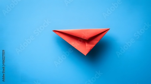 Free Download Red Paper Airplane on Blue Background Minimalist Design - GFXLoad