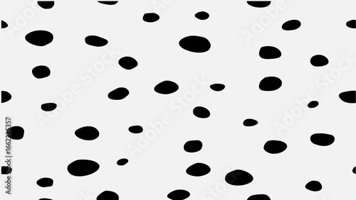 Black spots on a white background. Trendy seamless animal skin print.