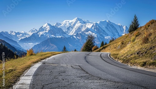 Winding mountain road autumn Alps scenic drive