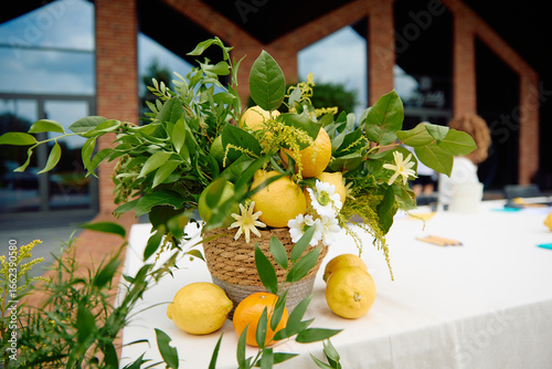 Fresh lemon centerpiece on outdoor table
