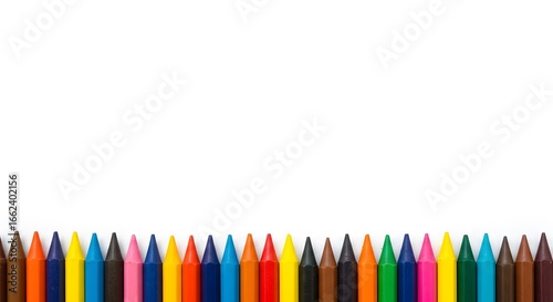 A Vibrant Array of Colored Crayons Lined Up Perfectly Against a Bright White Backdrop