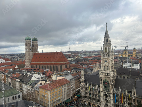 Historic Skyline of Munich Old Town Beneath a Cloudy Sky