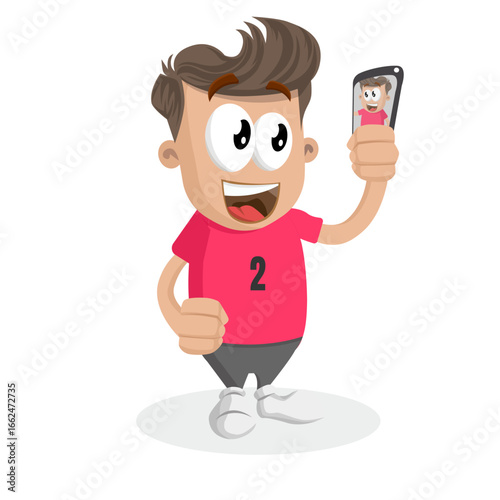 Young Boy In Red Soccer Jersey Taking A Selfie Portrait With Phone