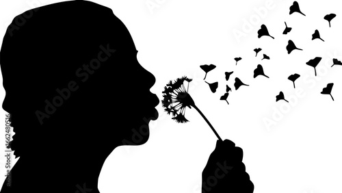 Silhouette of a person blowing on a dandelion causing seeds to scatter into the air in black and white