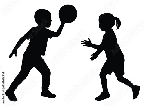 Silhouette of children playing with a ball outdoor sport and recreation