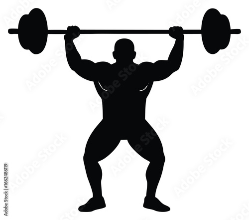 Silhouette of weightlifter lifting barbell overhead during training session in gym